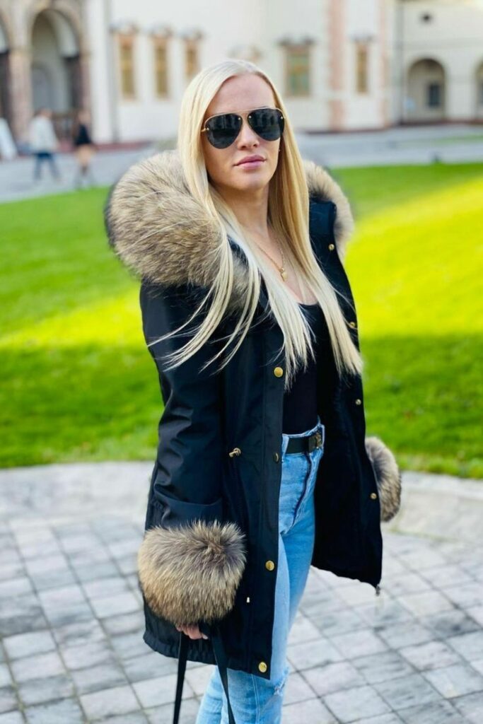 Parka- with -Fur- Trim Styled -with- Riding -Boots-is-another-old-money-outfit-ideas-for-ladies