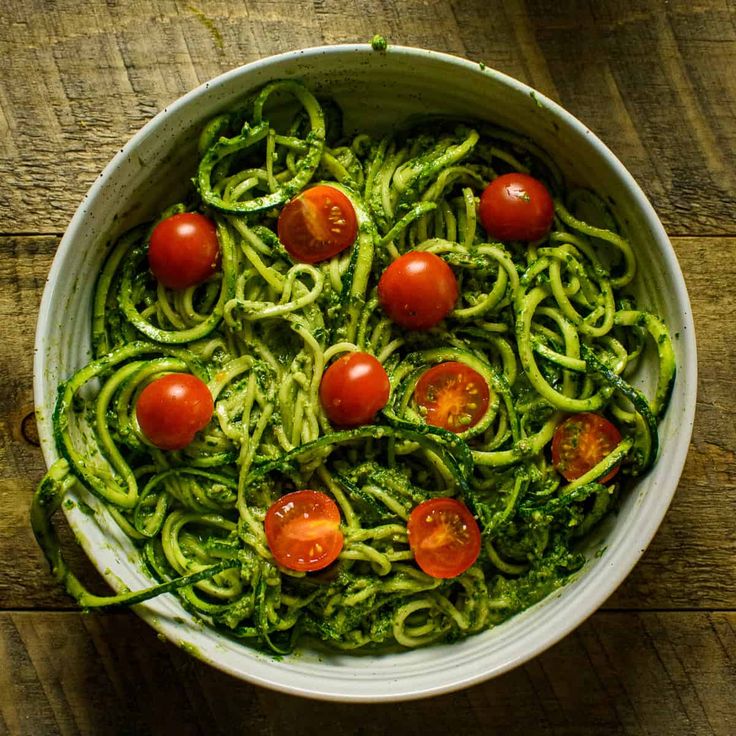 The-image-shows-Zucchini- Noodle-Salad -with- Pesto-in-a-bowl