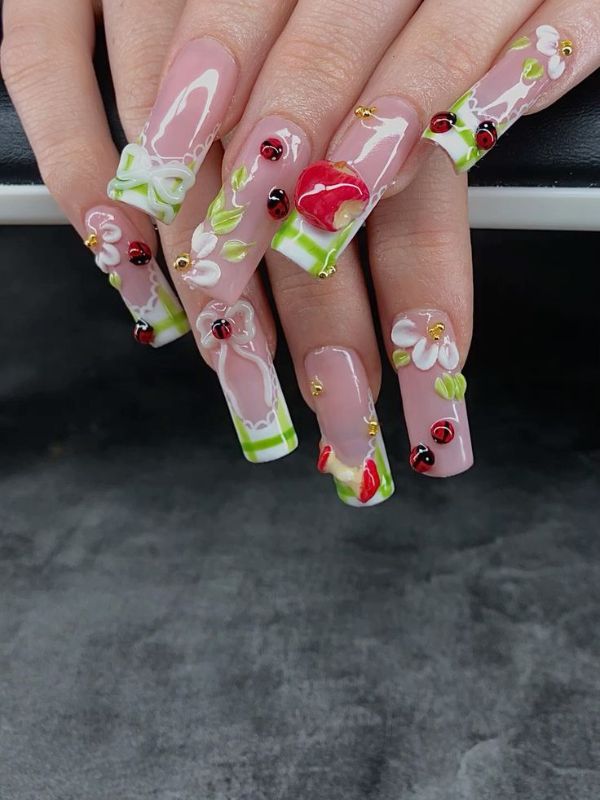 Juicy-3D-strawberry-nails-with-glossy-red-details.