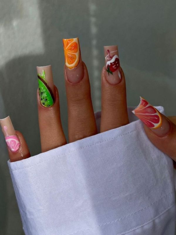 minimal-micro-fruit-nail-art-on-a-long-coffin-shaped-nails.
