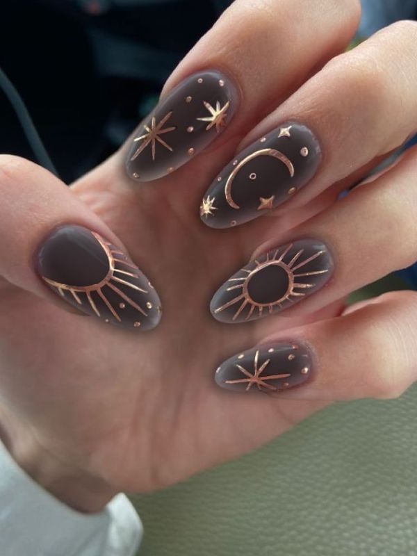 moon-phase-nail-art-on-dark-nail. 