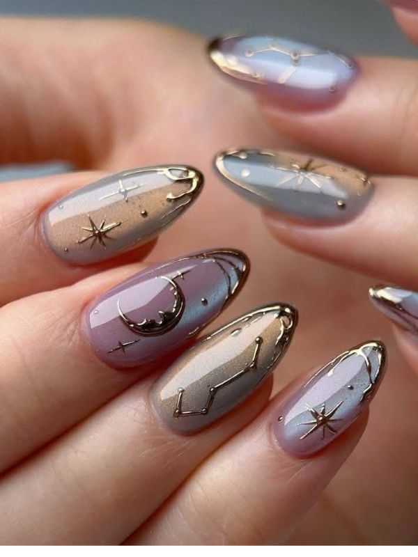 silver-chrome-nails-with-celestial-symbols.