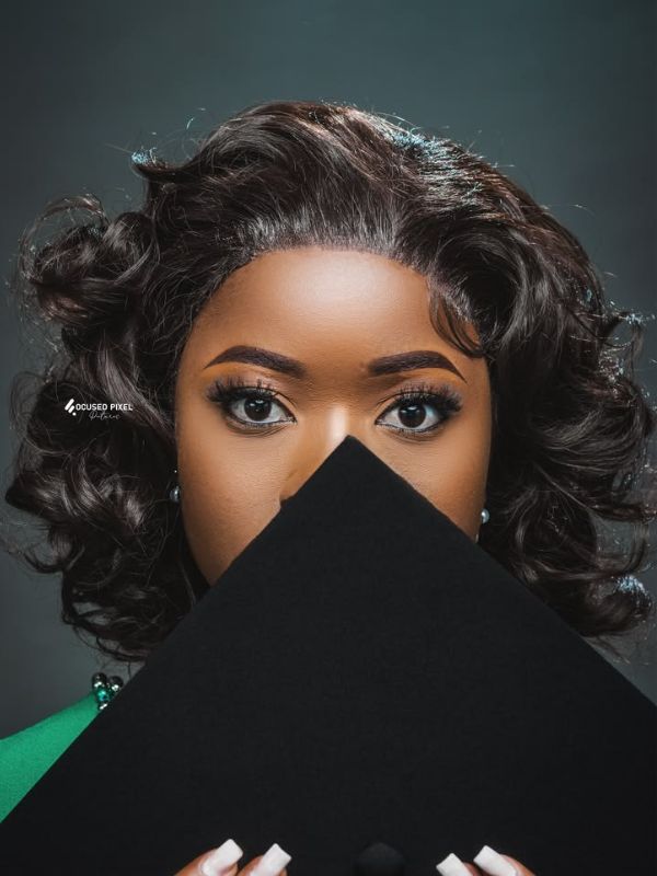 25-Stunning-Graduation-Photoshoot-ideas-for-adults-featuring-cap-covering-your-face.