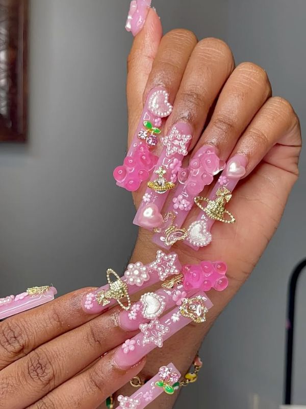 Pink-Junk-Nails-With-Colorful-Charms.
