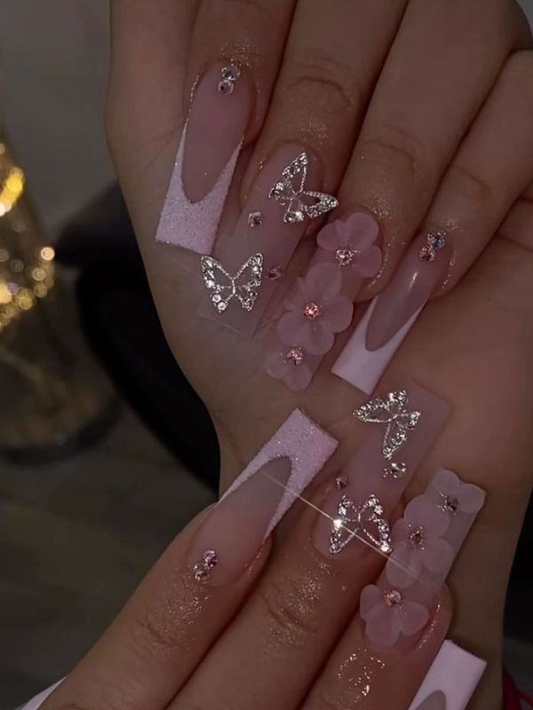 Pink-Nails-With-Silver-Charms.
